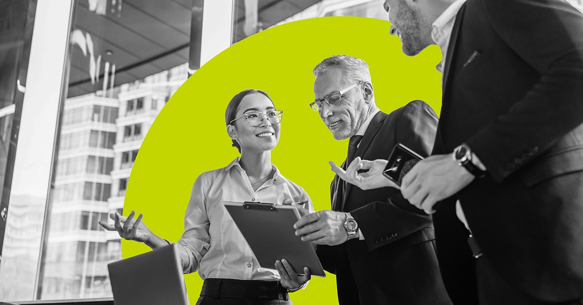 A group of professionals discussing B2B customer loyalty.