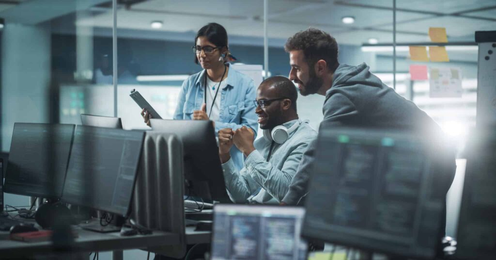 Team celebrating after solving marketing automation challenges.