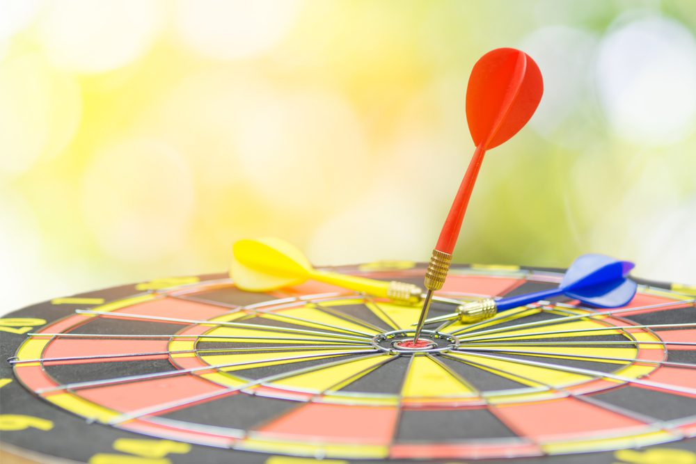 B2C Lead Scoring illustrated by a dart hitting a bullseye.