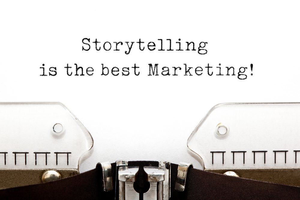 "Storytelling is the best marketing" typed on a typewriter page. 