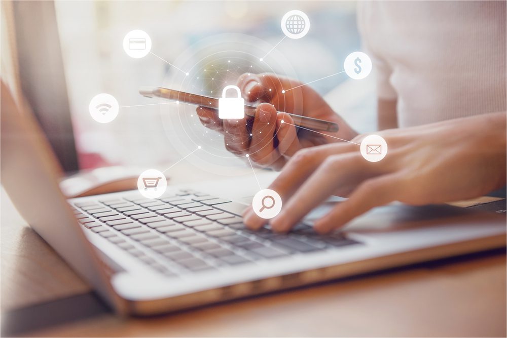 Receiving an event-triggered email on a laptop.