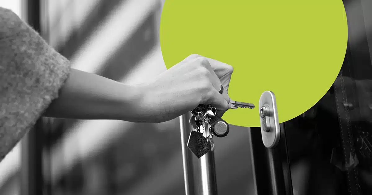 Gmail Manage Subscriptions feature illustrated by a hand bringing keys up to a lock.