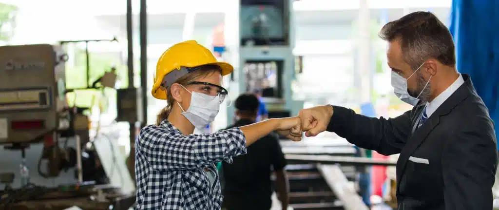 Persona-based marketing illustrated by a female worker giving a fist bump to a marketing executive.